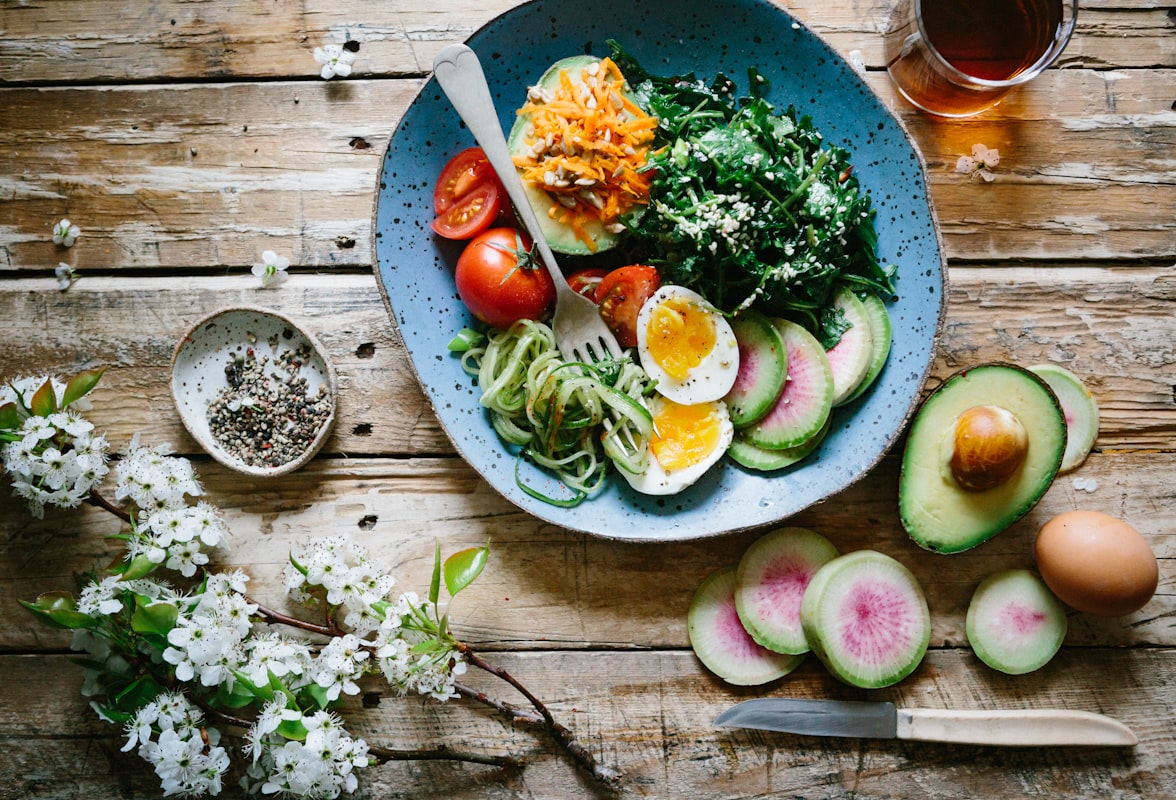 Mediterranean-style dinner with grilled fish, vegetables, and olive oil